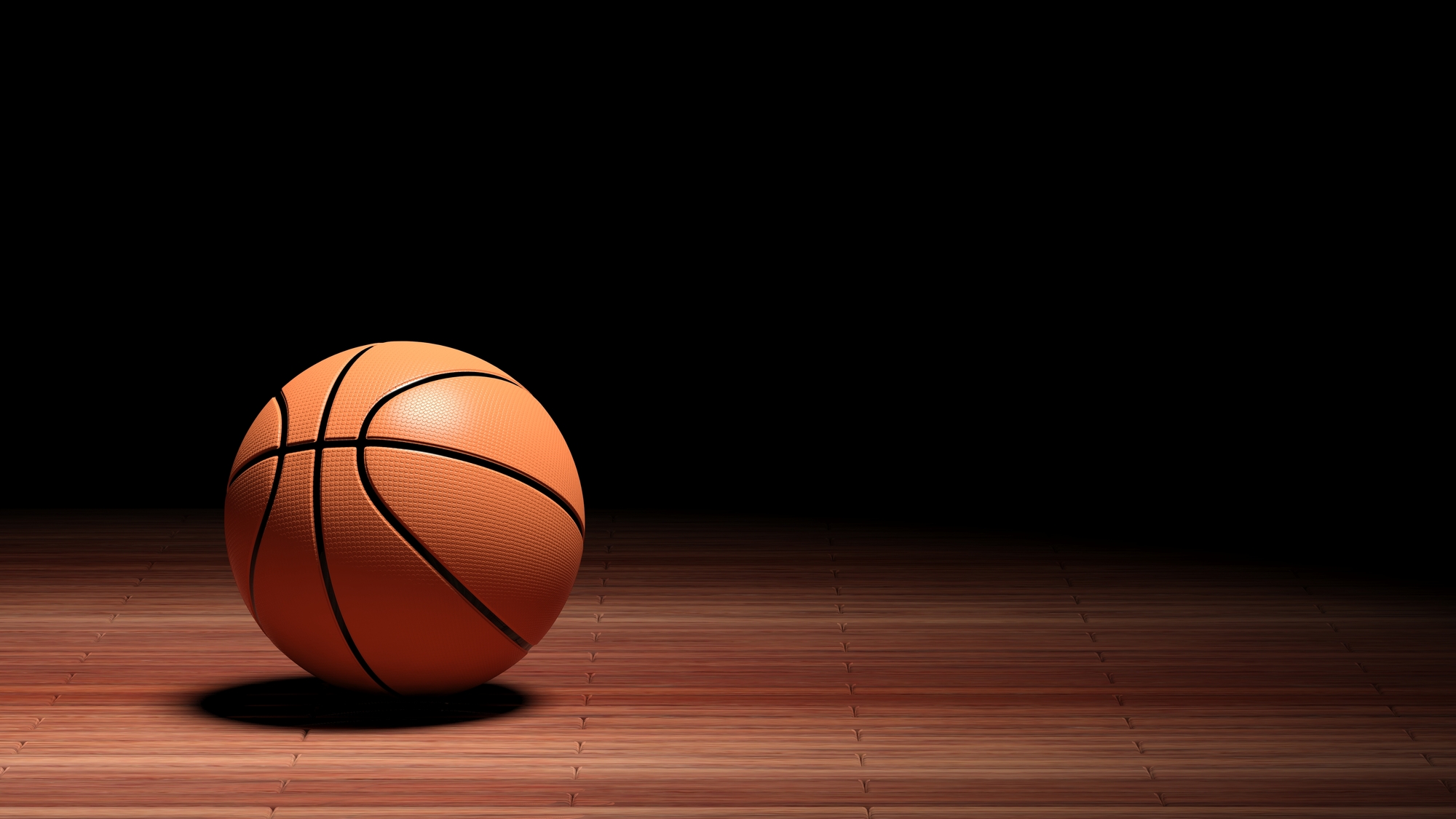 Basketball court floor with ball isolated on black and copy-space